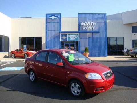 Victory Red Chevrolet Aveo LS Sedan.  Click to enlarge.