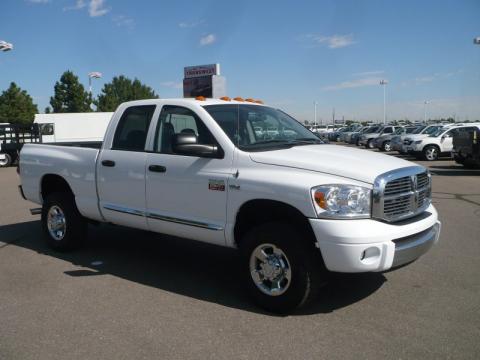 Bright White Dodge Ram 2500 Laramie Quad Cab 4x4.  Click to enlarge.