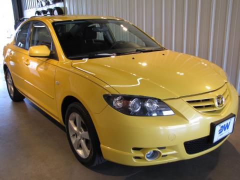 Solar Yellow Mica Mazda MAZDA3 s Sedan.  Click to enlarge.