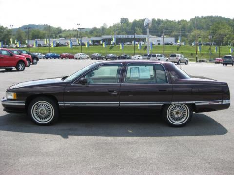 Dark Cherry Metallic Cadillac DeVille Sedan.  Click to enlarge.