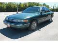 Front 3/4 View of 1995 Ford Crown Victoria  #8