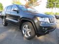 Front 3/4 View of 2011 Jeep Grand Cherokee Overland #4