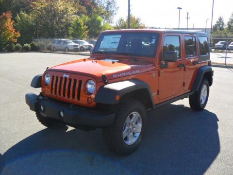 Jeep Wrangler Unlimited Rubicon 2011. Mango Tango Pearl 2011 Jeep