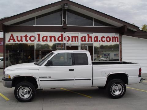 Bright White Dodge Ram 1500 SLT Club Cab 4x4.  Click to enlarge.