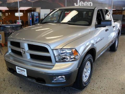 Bright Silver Metallic Dodge Ram 1500 SLT Outdoorsman Crew Cab.  Click to enlarge.