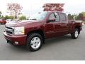 Front 3/4 View of 2009 Chevrolet Silverado 1500 LTZ Extended Cab 4x4 #5