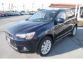 Front 3/4 View of 2011 Mitsubishi Outlander Sport SE 4WD #2