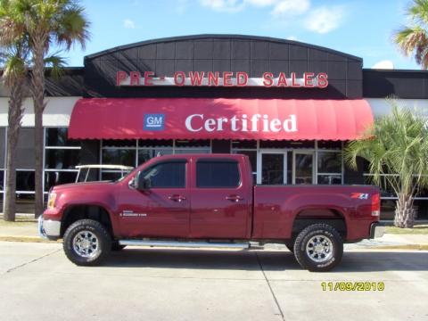 Dark Crimson Red Metallic GMC Sierra 2500HD SLT Z71 Crew Cab 4x4.  Click to enlarge.