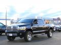 Front 3/4 View of 2006 Dodge Ram 2500 Laramie Mega Cab 4x4 #2