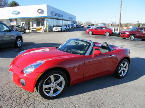 Aggressive Red Pontiac Solstice Roadster.  Click to enlarge.