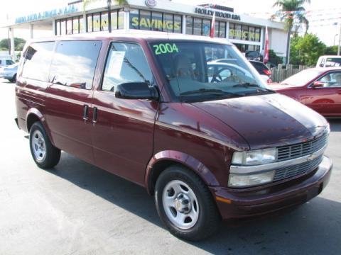 Dark Carmine Red Metallic Chevrolet Astro LT AWD Passenger Van.  Click to enlarge.