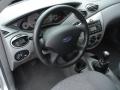 Dashboard of 2003 Ford Focus ZX3 Coupe #7