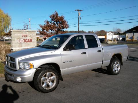 Bright Silver Metallic Dodge Ram 1500 SLT Quad Cab 4x4.  Click to enlarge.