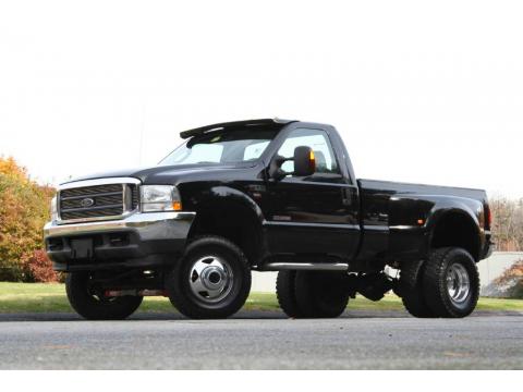 Black Ford F350 Super Duty XLT Regular Cab 4x4 Dually.  Click to enlarge.