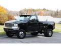 Front 3/4 View of 2004 Ford F350 Super Duty XLT Regular Cab 4x4 Dually #2