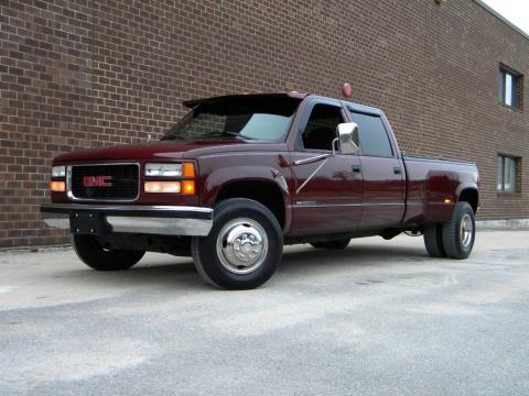 Dark Hunt Club Red Metallic GMC Sierra 3500 SLE Crew Cab 4x4 Dually.  Click to enlarge.