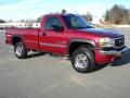 Front 3/4 View of 2005 GMC Sierra 2500HD SLE Regular Cab 4x4 #2