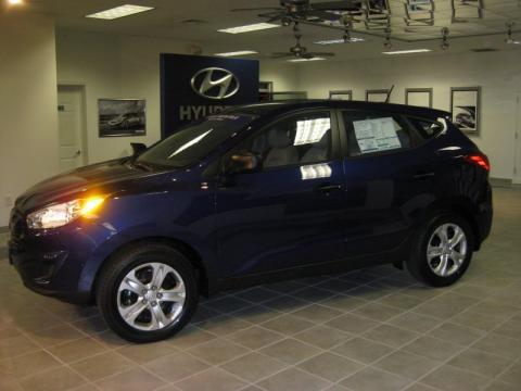 Hyundai Tucson 2011 Bronze. Iris Blue 2011 Hyundai Tucson