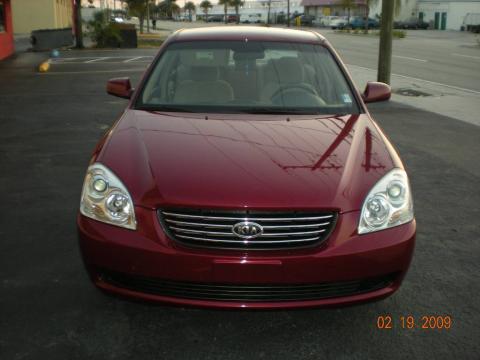 Ruby Red Kia Optima LX.  Click to enlarge.