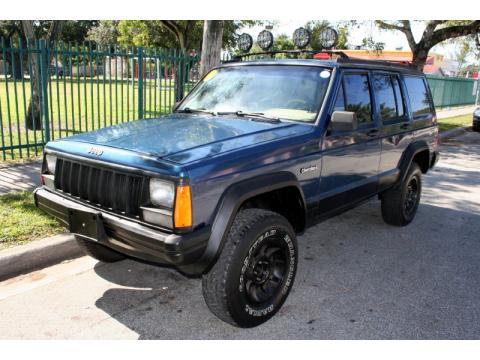 Dark Montego Blue Pearl Metallic Jeep Cherokee Sport.  Click to enlarge.