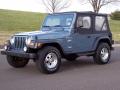 Front 3/4 View of 1997 Jeep Wrangler Sport 4x4 #8