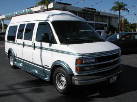 Olympic White Chevrolet Express 1500 Passenger Van Conversion.  Click to enlarge.