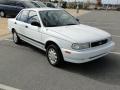 Front 3/4 View of 1994 Nissan Sentra XE Sedan #26