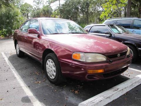 Ruby Red Pearl Toyota Camry LE Sedan.  Click to enlarge.