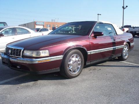 Dark Garnet Red Metallic Cadillac Eldorado Touring Coach Builders Limited Convertible.  Click to enlarge.