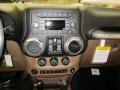 Dashboard of 2011 Jeep Wrangler Unlimited Sahara 4x4 #9