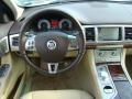 Dashboard of 2011 Jaguar XF Sport Sedan #13