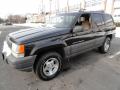 Front 3/4 View of 1997 Jeep Grand Cherokee Laredo 4x4 #1