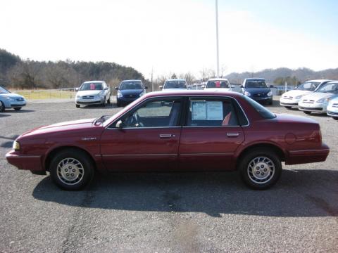 Medium Garnet Red Metallic Oldsmobile Cutlass Ciera S.  Click to enlarge.