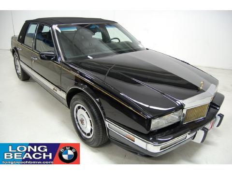 Black Cadillac Seville .  Click to enlarge.