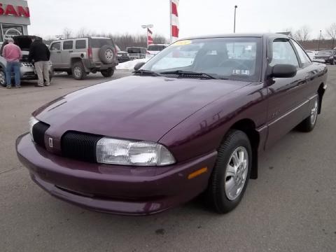 Dark Cherry Metallic Oldsmobile Achieva S Coupe.  Click to enlarge.