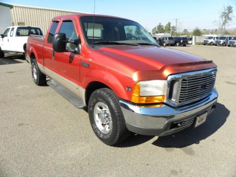 Bright Amber Metallic Ford F250 Super Duty Lariat Extended Cab.  Click to enlarge.