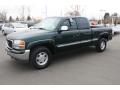 Front 3/4 View of 2001 GMC Sierra 1500 SLE Extended Cab 4x4 #5