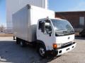 Front 3/4 View of 2004 Nissan Diesel UD 1400 Moving Truck #4