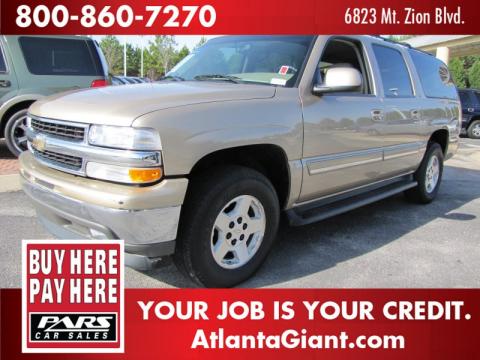 Sandstone Metallic Chevrolet Suburban 1500 LT.  Click to enlarge.