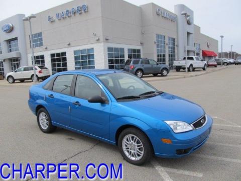 Aqua Blue Metallic Ford Focus ZX4 SE Sedan.  Click to enlarge.