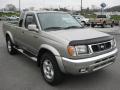 Front 3/4 View of 2000 Nissan Frontier SE V6 Extended Cab 4x4 #4
