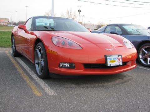 2011 Chevrolet Corvette Coupe. Inferno Orange Metallic 2011 Chevrolet Corvette Coupe with Ebony Black