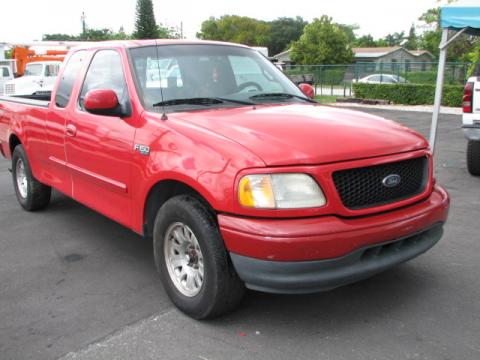 Bright Red Ford F150 Sport SuperCab.  Click to enlarge.