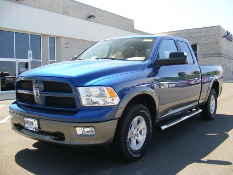 Deep Water Blue Pearl Dodge Ram 1500 SLT Outdoorsman Quad Cab 4x4.  Click to enlarge.