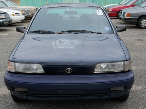 Dark Blue Pearl Metallic Toyota Camry Deluxe Sedan.  Click to enlarge.