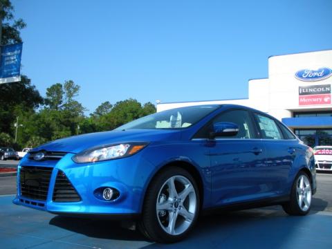 Blue Candy Metallic Ford Focus Titanium Sedan.  Click to enlarge.