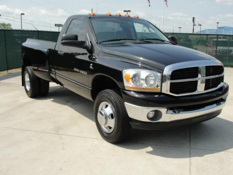 Black Dodge Ram 3500 SLT Regular Cab 4x4 Dually.  Click to enlarge.