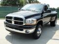 Front 3/4 View of 2006 Dodge Ram 3500 SLT Regular Cab 4x4 Dually #7