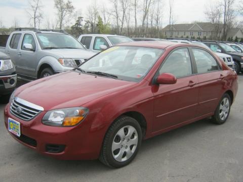 Spicy Red Metallic Kia Spectra EX Sedan.  Click to enlarge.