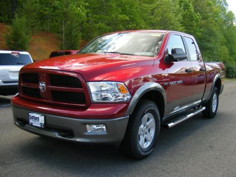 Deep Cherry Red Crystal Pearl Dodge Ram 1500 SLT Outdoorsman Quad Cab 4x4.  Click to enlarge.